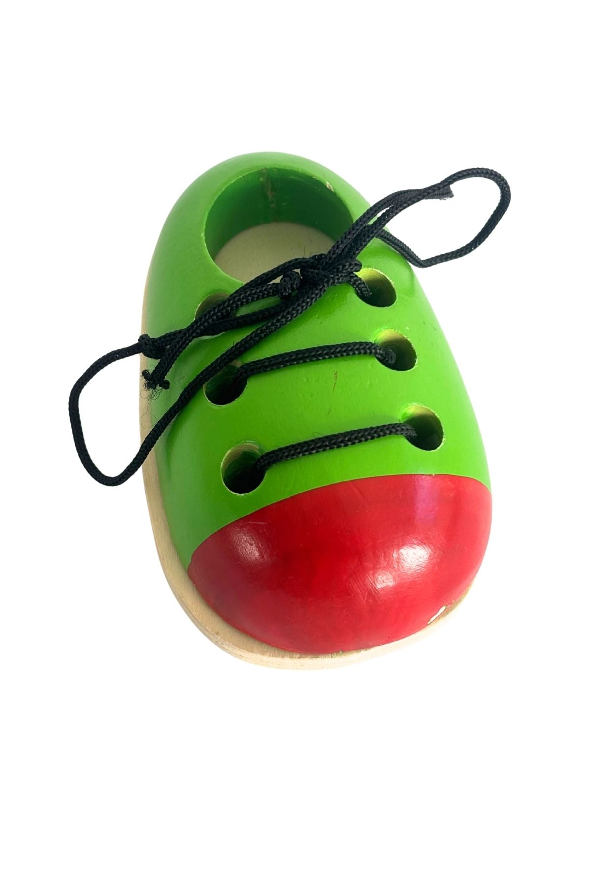 "Learn to tie your laces" wooden shoe