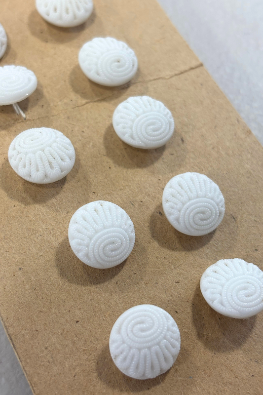 White textured vintage buttons