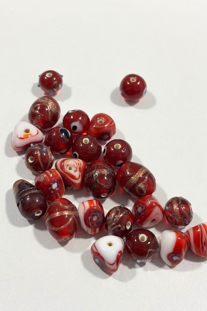 Assorted red Italian glass beads