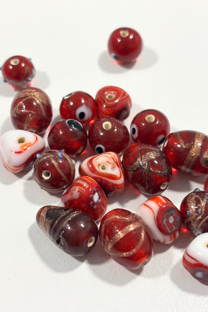 Assorted red Italian glass beads