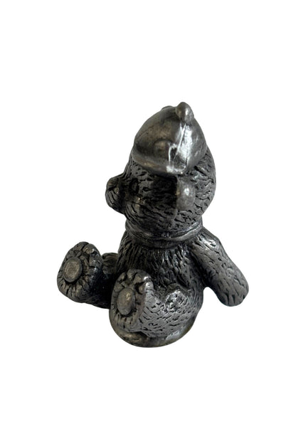 Tiny pewter teddy bear