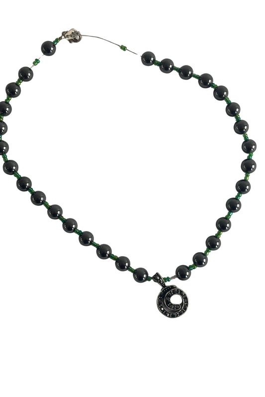 Beaded diamante koru necklace