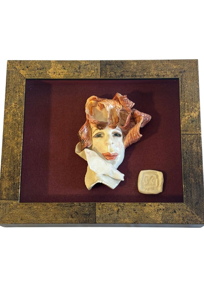 Funky framed clay portrait