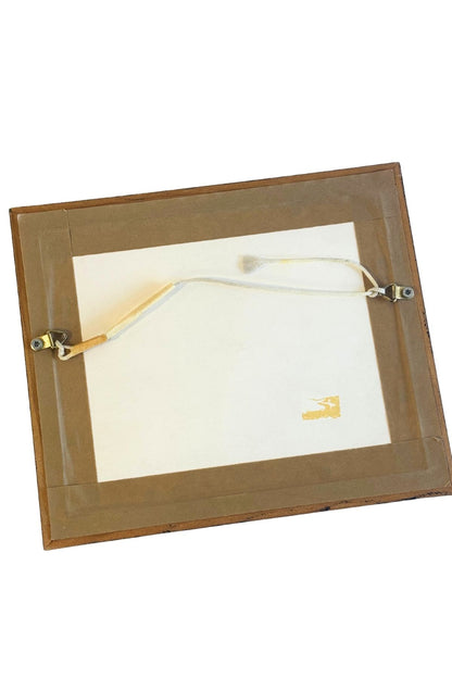 Funky framed clay portrait