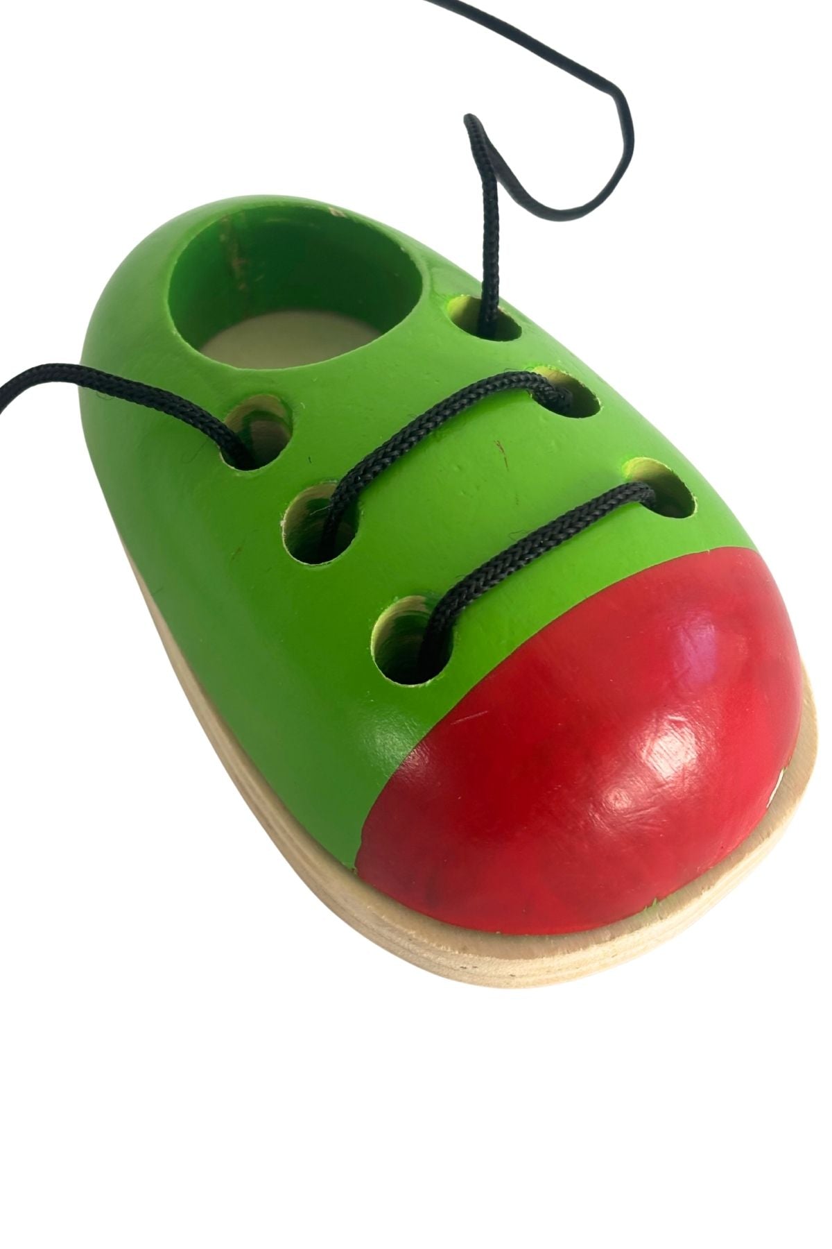 "Learn to tie your laces" wooden shoe