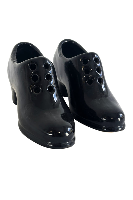 Ceramic black boots