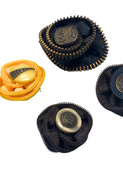 Bundle of zipper brooches