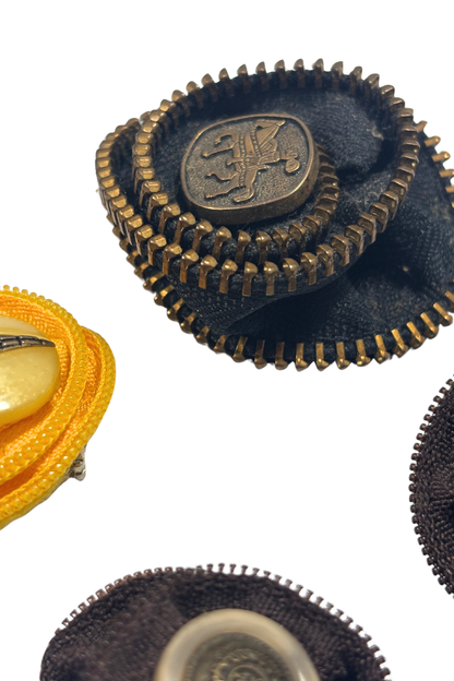 Bundle of zipper brooches
