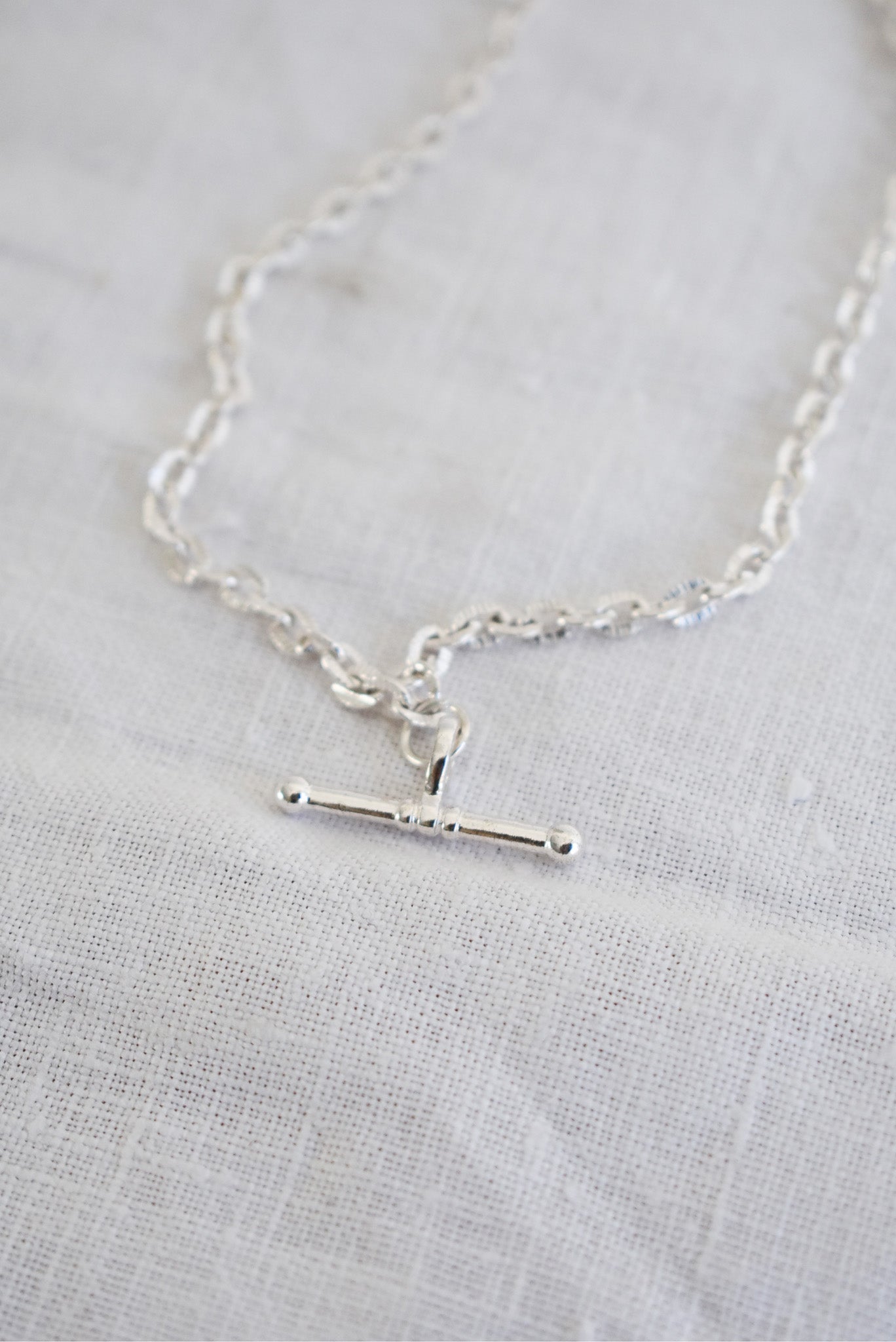 Silver toned metal T-chain necklace