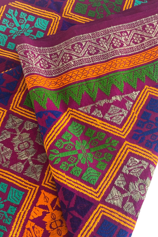 Vibrant colourful embroidered fabric