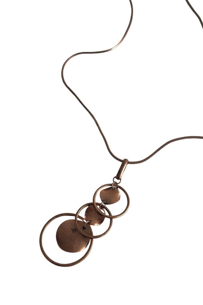 Copper toned cascading circles necklace