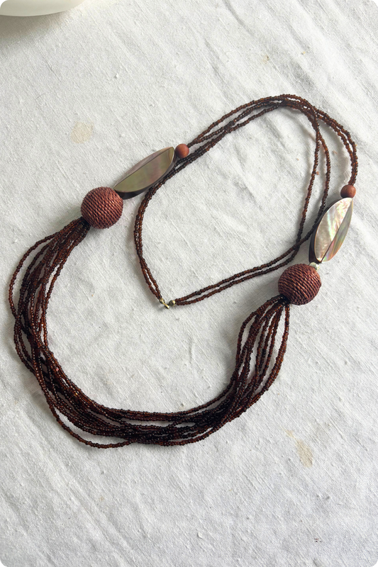 Long brown beaded necklace