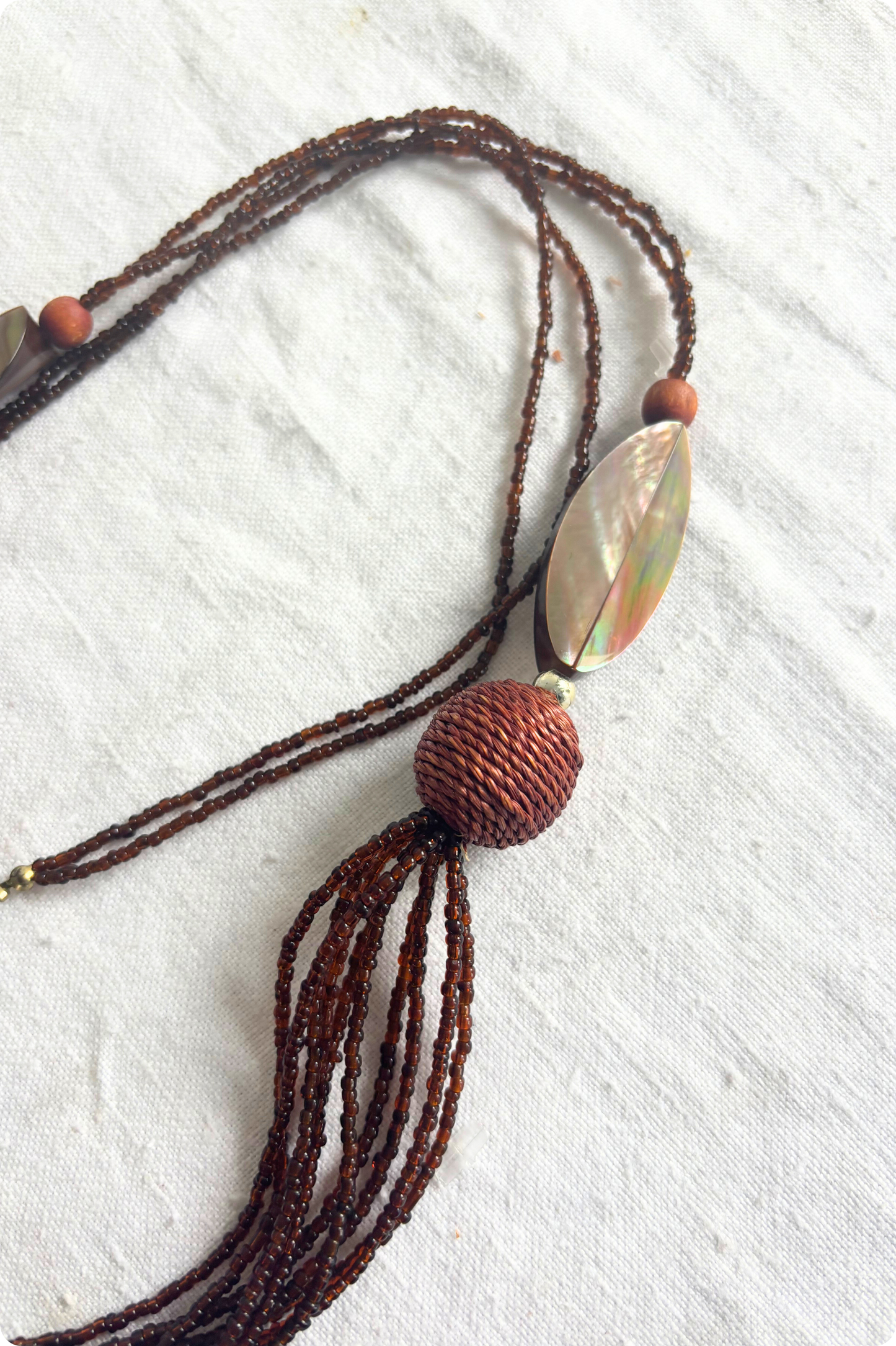 Long brown beaded necklace