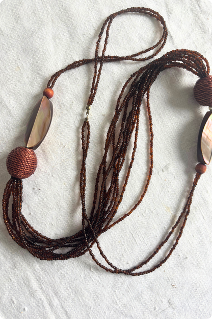 Long brown beaded necklace