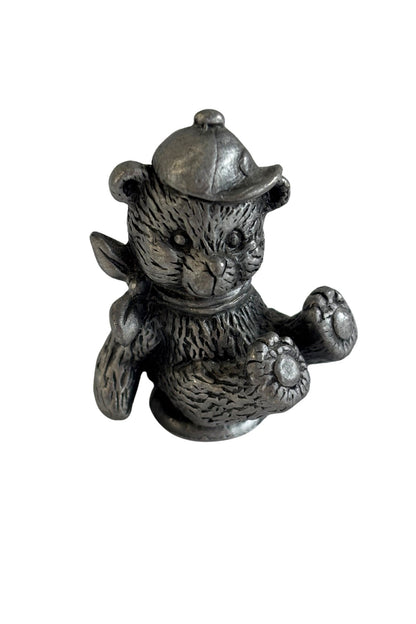 Tiny pewter teddy bear