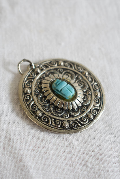 Large metal regal pendant