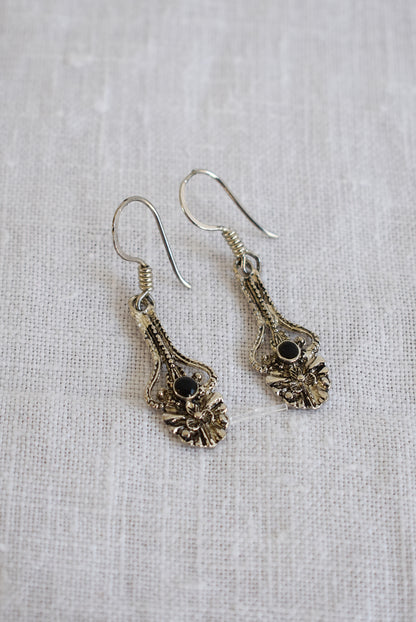 Ornate silver earrings
