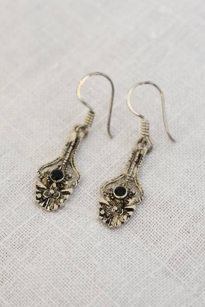 Ornate silver earrings