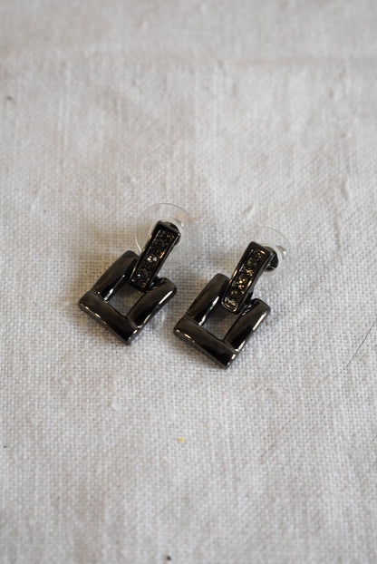Dangly buckle studs