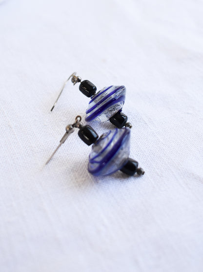 Blue and black glass swirly bead earrings